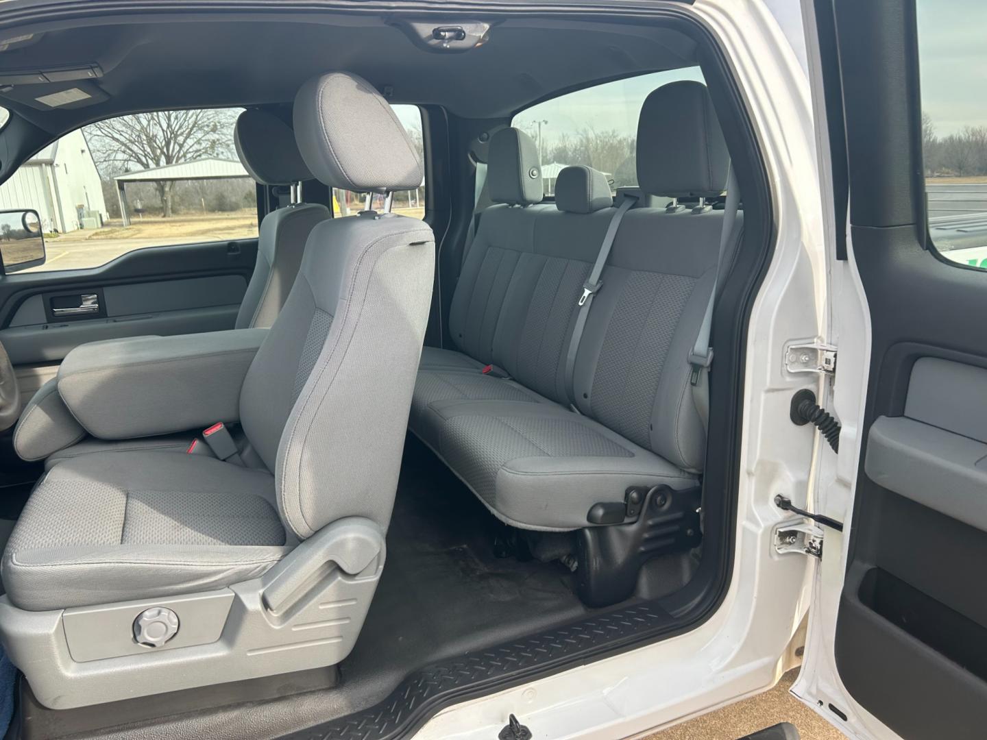 2014 White /Gray Ford F-150 (1FTEX1CM6EK) , 6-Speed Automatic transmission, located at 17760 Hwy 62, Morris, OK, 74445, (918) 733-4887, 35.609104, -95.877060 - 2014 FORD F-150 XLT SUPERCAB 6.5-ft. BED 2WD 3.8L V6 BI-FUEL (RUNS ON BOTH CNG OR GASOLINE) FEATURES POWER LOCKS, POWER WINDOWS, AM/FM STEREO, SIRIUS XM STEREO, CD PLAYER, AUXILLARY PORT, CRUISE CONTROL, TRACTION CONTROL, MULTI-FUNCTIONING STEERING WHEEL CONTROLS, BACK-UP CAMERA, BED LINER. HAS 86,7 - Photo#17